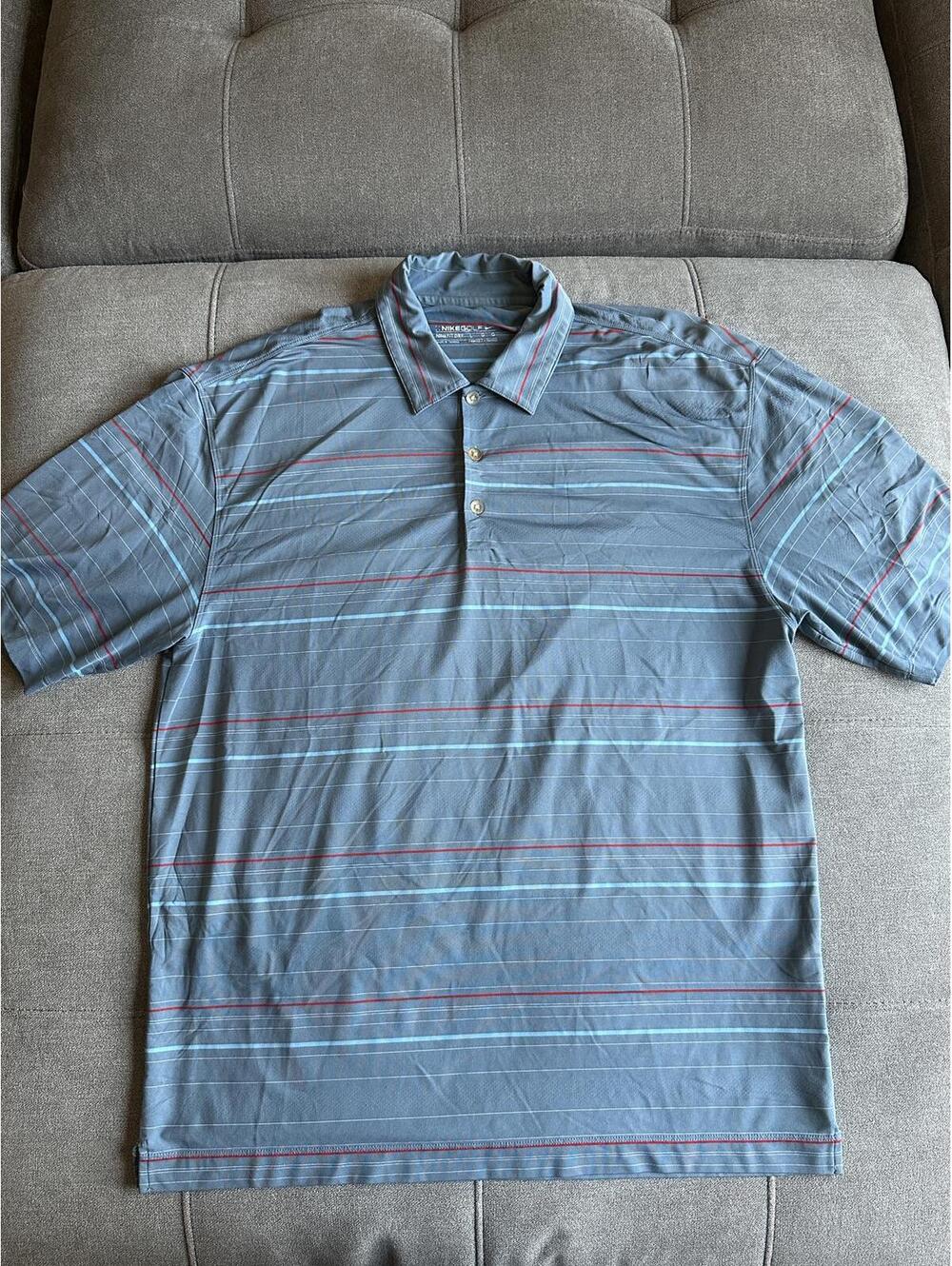 1990s Men's Nike Blue Striped Golf Polo